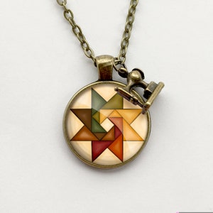 Circular Autumn Twirling Star Quilt Block Necklace
