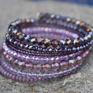 7 strand stacked faceted crystal bead bracelet, shades of purple