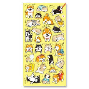 May include: A sheet of colourful stickers featuring various illustrations of Shiba Inu dogs in different poses and activities. The stickers are on a yellow background with Japanese text.