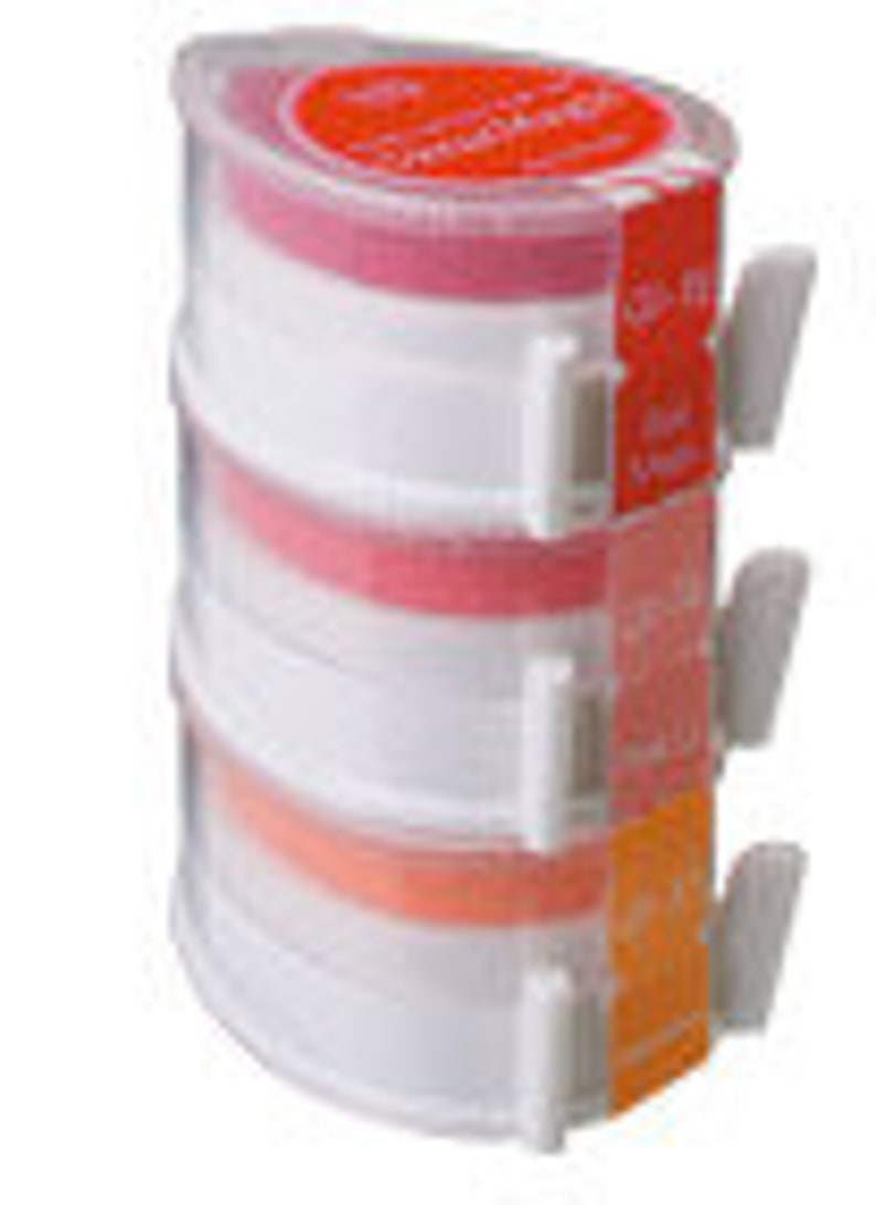 May include: Three-tiered clear plastic food container set with red, orange, and pink lids. The containers are stackable and have a locking mechanism.