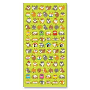 Puede incluir: Una hoja de pegatinas con varios perros Shiba Inu en diferentes poses y atuendos. Las pegatinas están sobre un fondo verde y presentan una variedad de colores, incluyendo rojo, azul, amarillo y verde.