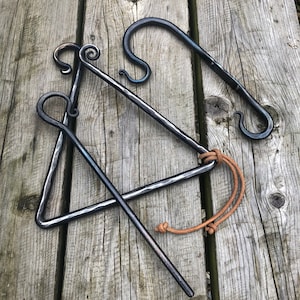 Triangle dinner bell. Home. Gifts. Hand Forged. Blacksmith Gifts