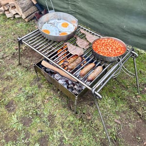 Stainless steel Camping Grill. Foldable. Outdoor BBQ Cooking. Outland Camper. Car Camping.