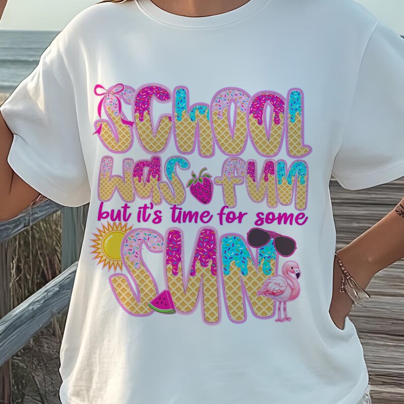 May include: White t-shirt with a pink, blue, and yellow graphic that says "School was fun but it's time for some sun". The graphic is made to look like ice cream cones with sprinkles and a flamingo.