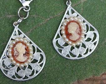 Cameo earrings Victorian Steampunk silver tone filigree brown cameo costume jewelry with no hole pearls and lever back ear wires.