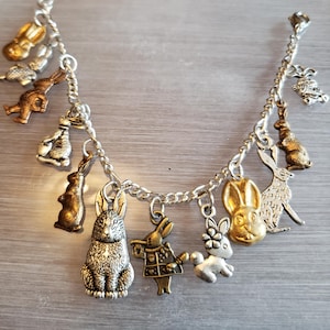 Rabbit bracelet Handmade Vintage Recycled Victorian Fashion and Costume jewelry with 12 unique and different charms.  Free shipping eligible