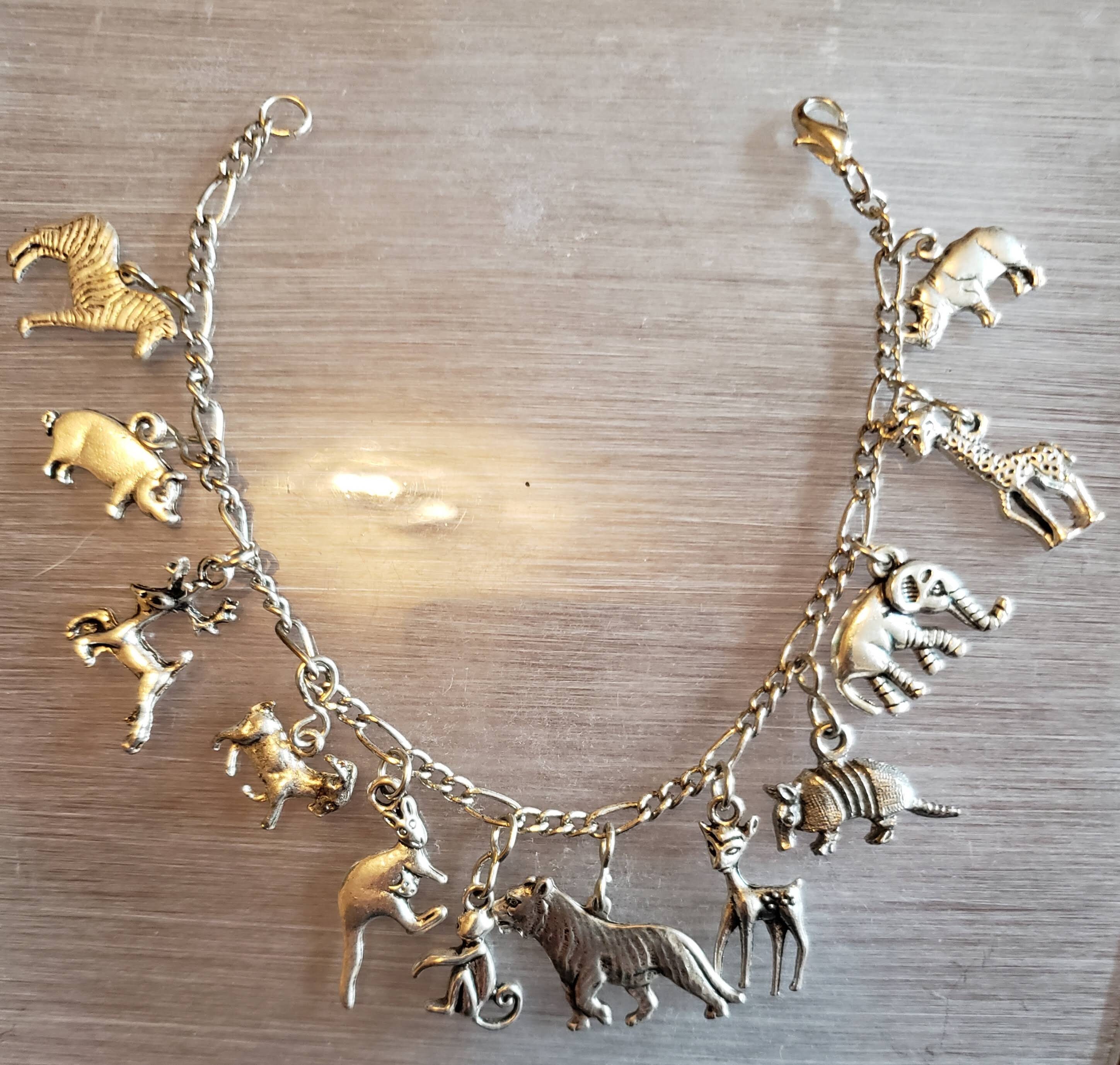 Animals Charm Bracelet Handmade Vintage Recycled Victorian Costume and Fashion Jewelry With 12 Different Charms. Free Shipping Eligible. - Etsy Animals Charm Bracelet Handmade Vintage Recycled Victorian Costume and Fashion Jewelry With 12 Different Charms. Free Shipping Eligible. - Etsy