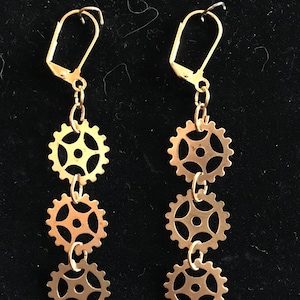 Earrings Steampunk Handmade Vintage style clock part gears gold wheels and cogs.  Recycled up-cycled Victorian from pocked watches