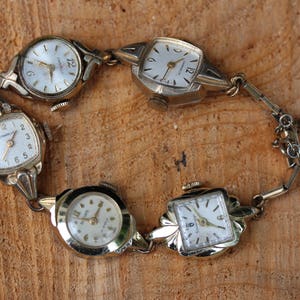 Watch bracelet Handmade w/ ladies wind up watches that do not work from 1940's to the 1950's Victorian Vintage Recycled Unique Steampunk .