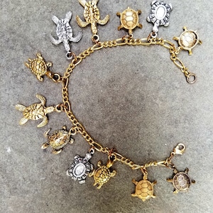 Turtle Bracelet Handmade Vintage Victorian Recycled Fashion and Costume jewelry with 12 unique charms.  Spend 35 to get FREE SHIPPING