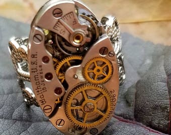 Bague Steampunk vintage fait à la main victorien recyclé recyclé à partir de pièces de montres pour femmes bijoux de mode/costume montés sur une nouvelle bague en filigrane.