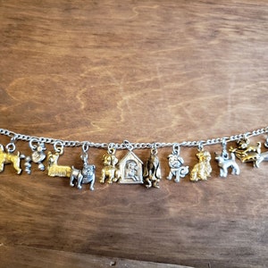 Dogs lovers Bracelet Handmade Vintage Recycled Victorian Costume and Fashion jewelry w/ 12 different unique charms. FREE Shipping eligible