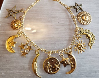 Moon, Stars & Sun Bracelet Handmade Victorian Vintage Recycled Fashion/Costume jewelry with 12 different charms.  Free shipping eligible.