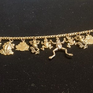 Frog Bracelet Handmade Vintage Recycled Upcycled Victorian Costume & Fashion Jewelry. 12 unique charms.  Eligible for FREE Shipping.