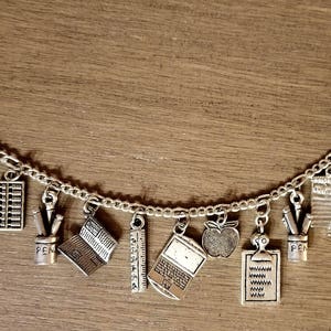 Teacher Bracelet Handmade Vintage Victorian Recycled Costume and Fashion jewelry w/ 12 unique and different charms.  Free shipping eligible.