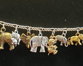 Bransoletka ze słoniem. Ręcznie robiona biżuteria modowa/kostiumowa w stylu vintage z epoki wiktoriańskiej, z recyklingu, ze srebrnymi i złotymi zawieszkami. Przy zakupie za 35,00 USD, DARMOWA WYSYŁKA.
