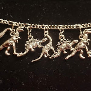 Dinosaur Bracelet Handmade recycled Brontosaurus  Apatosaurus Brachiosaurus and TRex charms fashion and costume jewelry Spend 35 Free SHIP