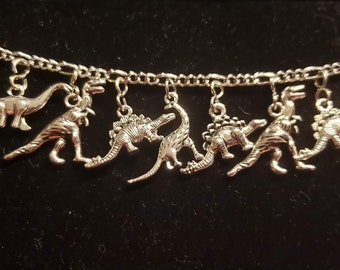 Dinosaur Bracelet Handmade recycled Brontosaurus  Apatosaurus Brachiosaurus and TRex charms fashion and costume jewelry Spend 35 Free SHIP