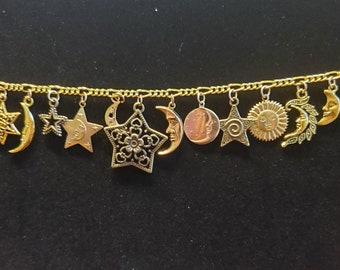 Moon Stars & Sun Bracelet Handmade Vintage Recycled Victorian  Costume and Fashion Jewelry with 12 different charms  Free shipping eligible