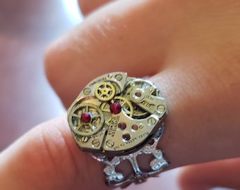 RING Handmade Steampunk Recycled made from a ladies Victorian vintage watch movement from the  1940's. The red stones are Austrian crystals.