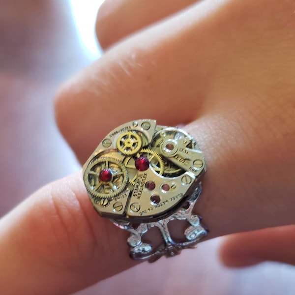 RING Handmade Steampunk Recycled made from a ladies Victorian vintage watch movement from the  1940's. The red stones are Austrian crystals.