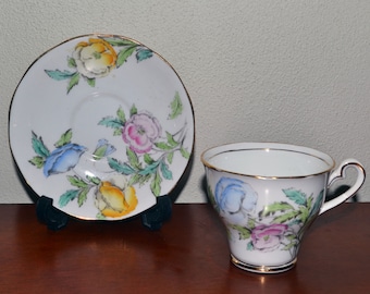 Tasse à thé et soucoupe en porcelaine tendre Salisbury vintage : fleurs de pavot pastel, fabriquées en Angleterre