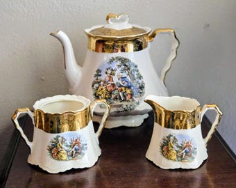 Théière W.S. George portant les marques « Warranted » et « Ardalt ». Détails en or 22 carats.
