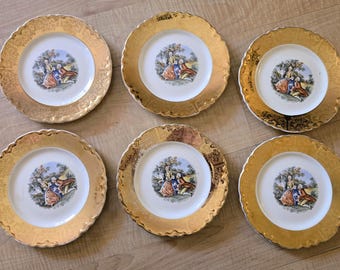 Assiettes W.S. George portant les marques « Warranted » et « Ardalt ». Détails en or 22 carats. Service de 6. Diamètre : 17,8 cm (7 pouces).
