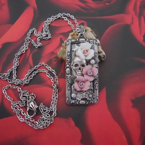 Skull Peeking from Garden Pendant Necklace Silver Skull Pink and White Ceramic Roses Faux Pearls Silver Plate Flowers and Setting