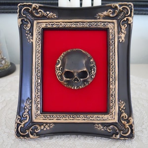 Ornate Gothic Framed Skull Hand Painted Vintage Frame Creepy Elegance Black and Gold on Red Velvet Macabre Spooky Wall Decor