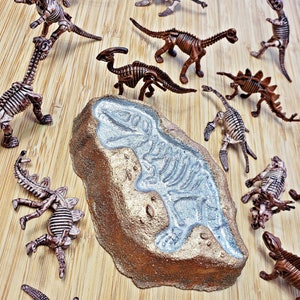Dinosaur toy with skeleton inside discount