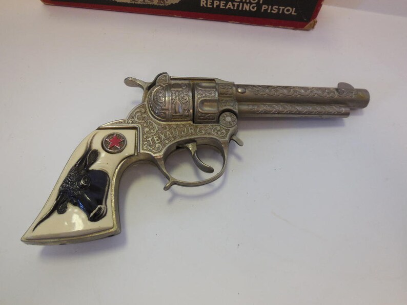 The Texan 50 Shot Repeater Toy Pistol Hubley Cap Gun Etsy