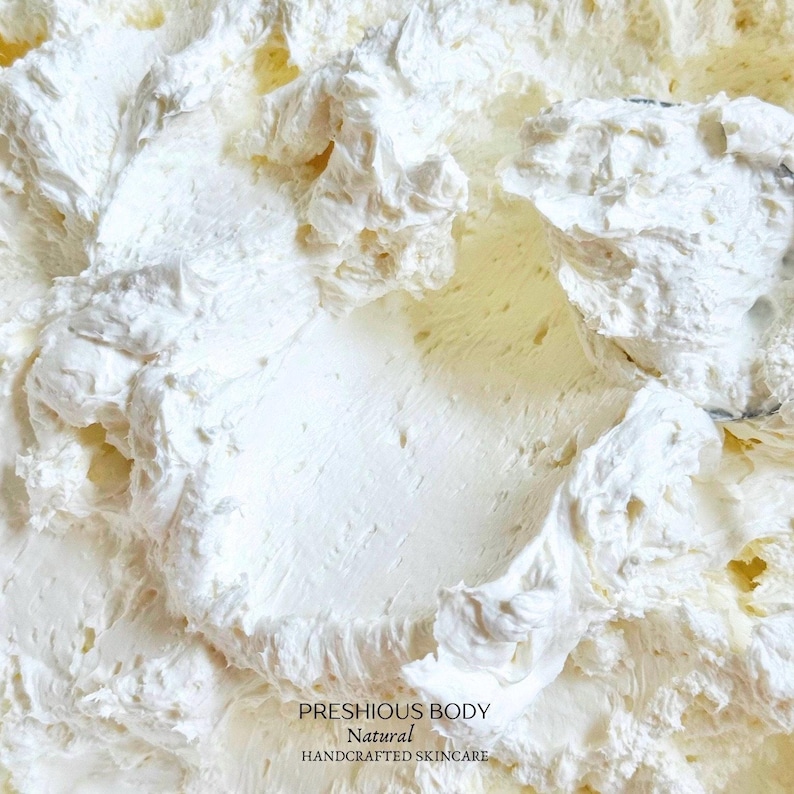 A photo of creamy body butter with its texture shown