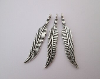 3 Breloques plume 37 x 7 mm en métal argenté