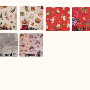 K&ouml;nnte beinhalten: Sechs verschiedene Stoffmuster mit Weihnachtsmotiven. Die Muster sind mit folgenden Namen beschriftet: "Ourson", "Tambour", "Lutin", "Lutin farceur", "P&ocirc;le nord" und "Renne rose".