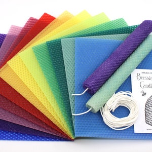 May include: A beeswax candle making kit with sheets of colored beeswax, a wick, a pre-made candle, and instructions.  Make it yourself Beeswax Candle Making Kit.