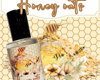 May include: A glass bottle of honey oats scented oil with a yellow and white label. The label features a watercolor illustration of honey dripping from a honeycomb, oats, bees, and flowers. The text "Honey oats" is printed on the label.