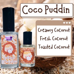 May include: Two small bottles of coconut scented perfume oil. The bottles are clear glass with black caps and labels that say "Zelda's Cauldron". The larger bottle has a label that says "Coco Puddin". The smaller bottle has a label that says "Zelda's Fragrant Cauldron". The bottles are sitting on a background of shredded coconut.