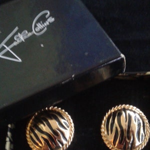 Jackie Collins pierced tiger earrings. Vintage Exotic wild animal