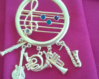 Music vintage golden brooch dangling charms, clef stone accents