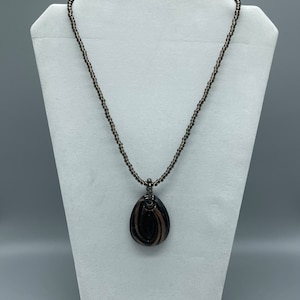One-of-a-Kind Brown Necklace with Shimmering Bronze in the Pendant