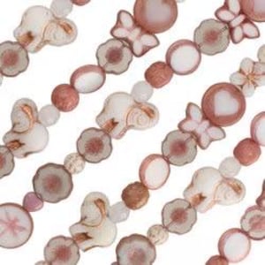 May include: Strands of decorative beads in various shapes and colors. The beads include butterflies, flowers, and round shapes in shades of white, pink, and brown. The beads are strung together, creating a pattern.