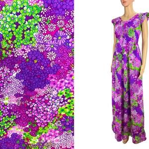 May include: A long purple maxi dress with a floral print featuring pink, green, and white flowers. The dress has a scoop neck and short sleeves with ruffles.
