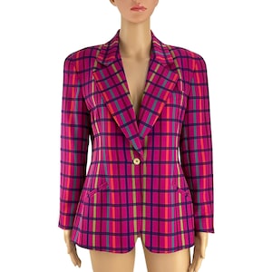May include: A pink, blue, and yellow plaid blazer with a single button closure.