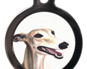 May include: A watercolor painting of a light brown and white Greyhound dog with its mouth open, looking to the right. The painting is on a white background and is framed in a silver circle.