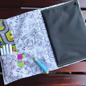 Placemat with toy car track, blackboard or coloring side, foldable into bag