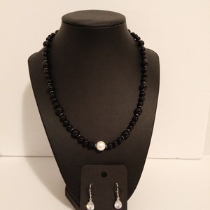 Solid Sterling silver Jewelry set with a black onyx & shell pearl beaded 18&quot; necklace. CZ rhodium plated earrings 1&quot; long. Handmade.
