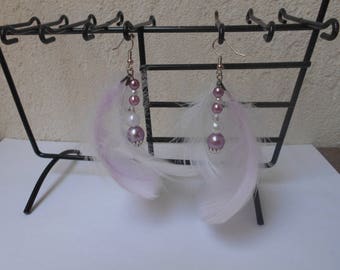 Purple and white earrings with feathers