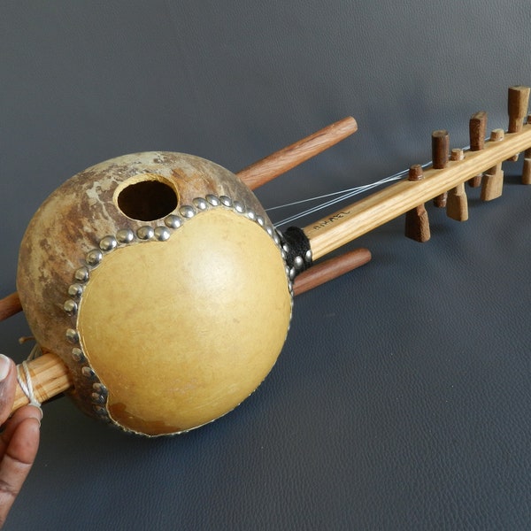 Kora with 8 strings mounted on calabash gourd, key to adjust African musical note, xylophone African musical instrument Lamaisonrafacia