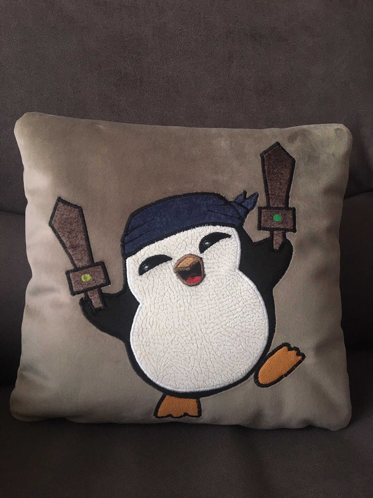 Featherknight penguin cushion | Etsy